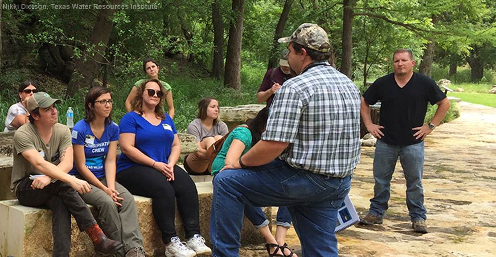 Kyle Wright with the Natural Resources Conservation Service discusses agricultural programs during a riparian workshop in Wimberley. 